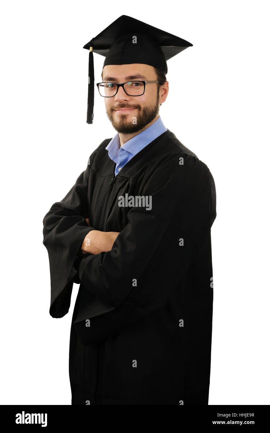 Estudiante graduado vistiendo bata y tapa aislado sobre fondo blanco. Foto de stock