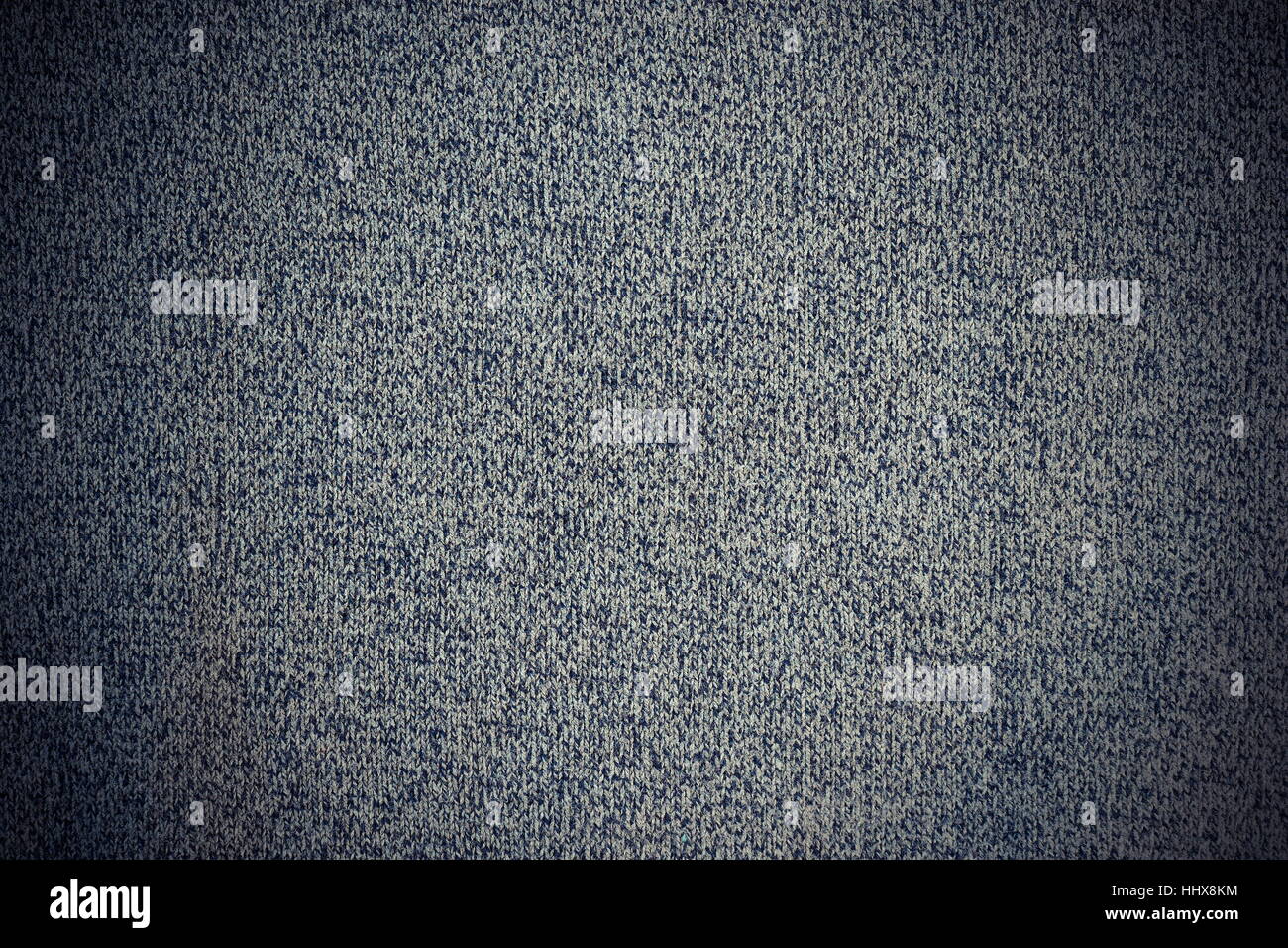 La textura del material gris suéter de ganchillo con vignette Foto de stock