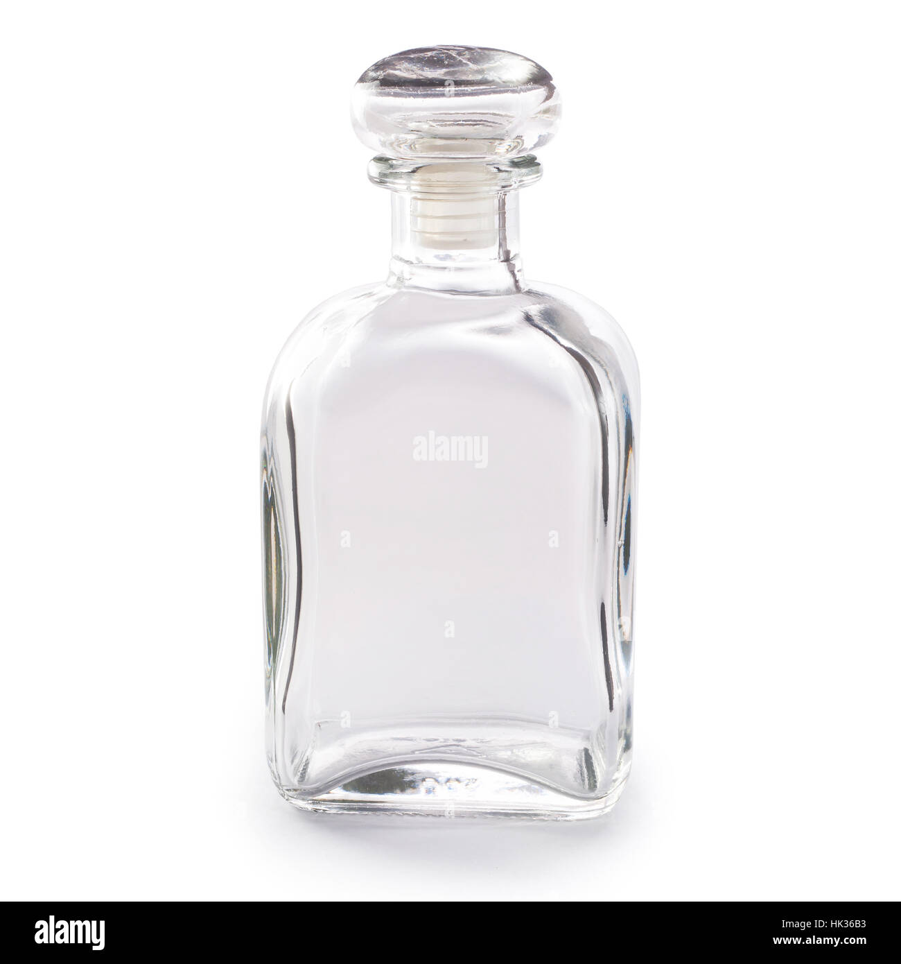 Vacíe la botella de cristal aislado sobre fondo blanco. Foto de stock