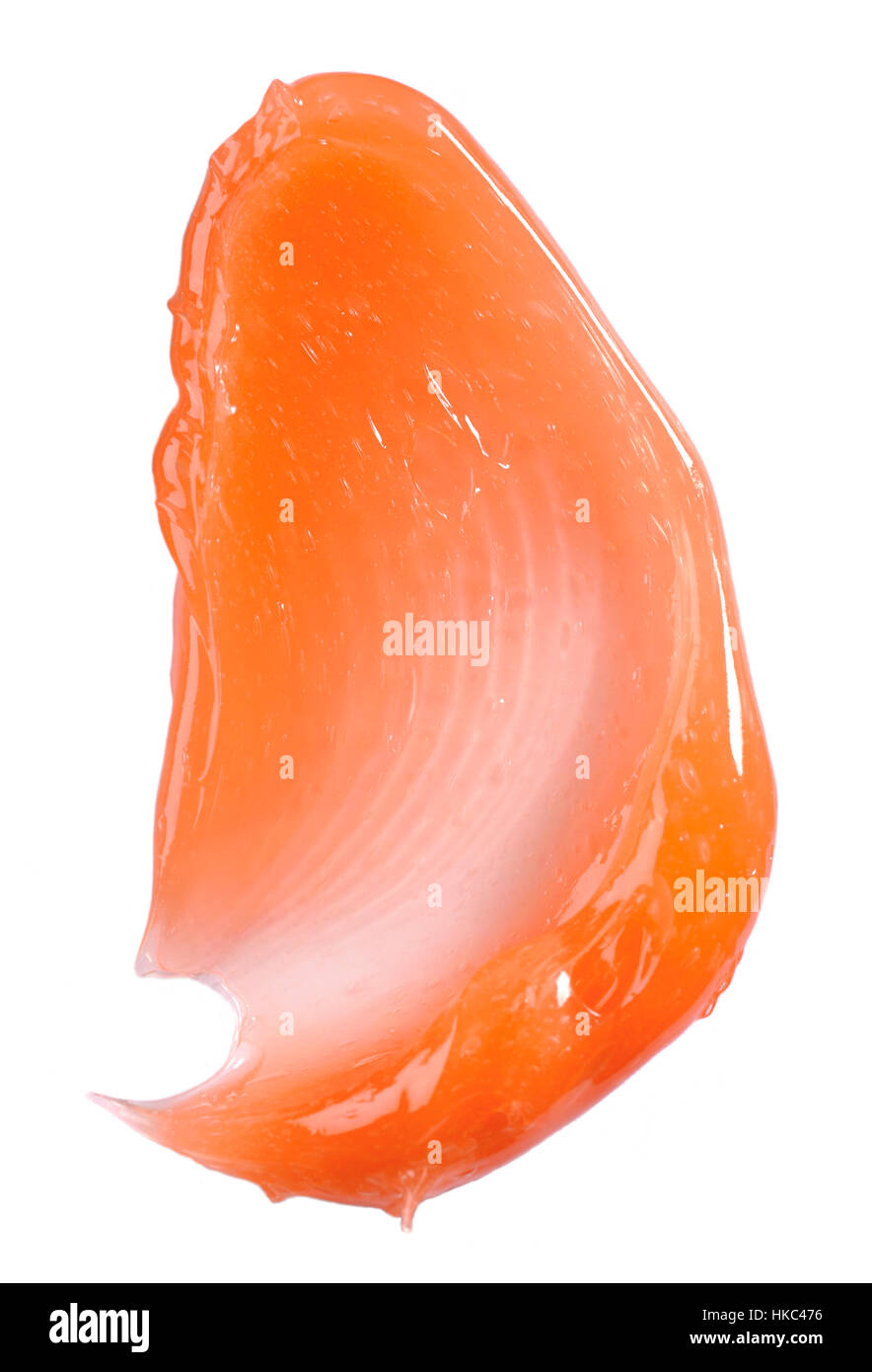 Un recorte de la belleza de la imagen de una muestra de gel limpiador de naranja. Foto de stock