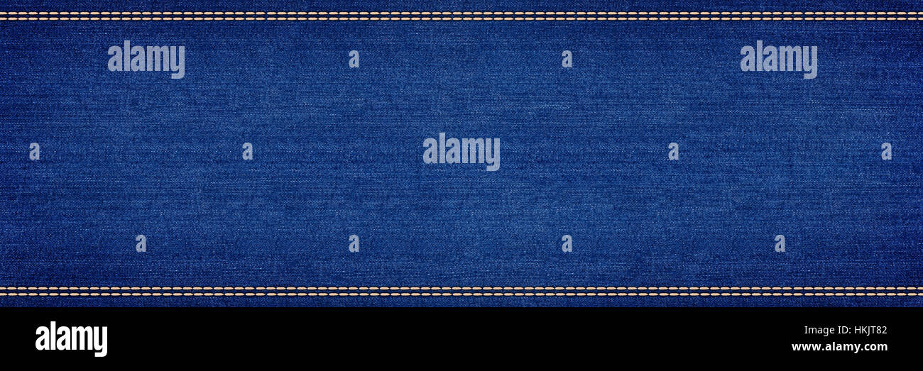 Vacío azul indigo denim jeans amplio panorama textura patrón de diseño de fondo Foto de stock