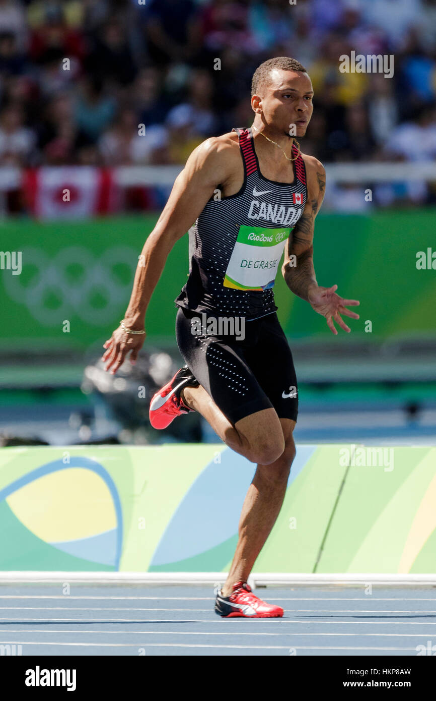Río de Janeiro, Brasil. 13 de agosto de 2016. Andre De Grasse (CAN) compitiendo en los hombres 100m calienta en los Juegos Olímpicos de Verano de 2016. ©Paul J. Sutton/PCN Foto de stock