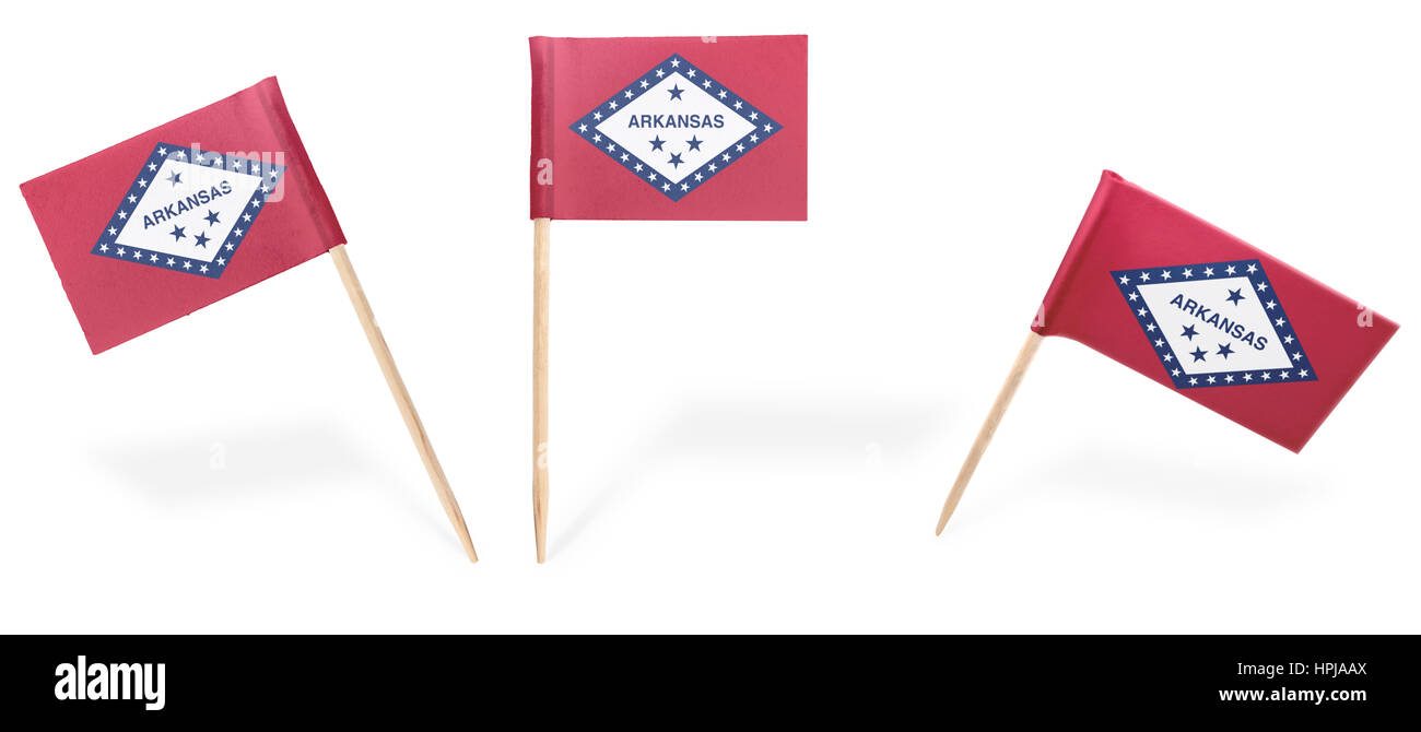 Cóctel de pequeñas banderas de Arkansas en diferentes posiciones aislado en blanco.(serie) . Además de fácil de utilizar como un elemento de diseño :). Foto de stock
