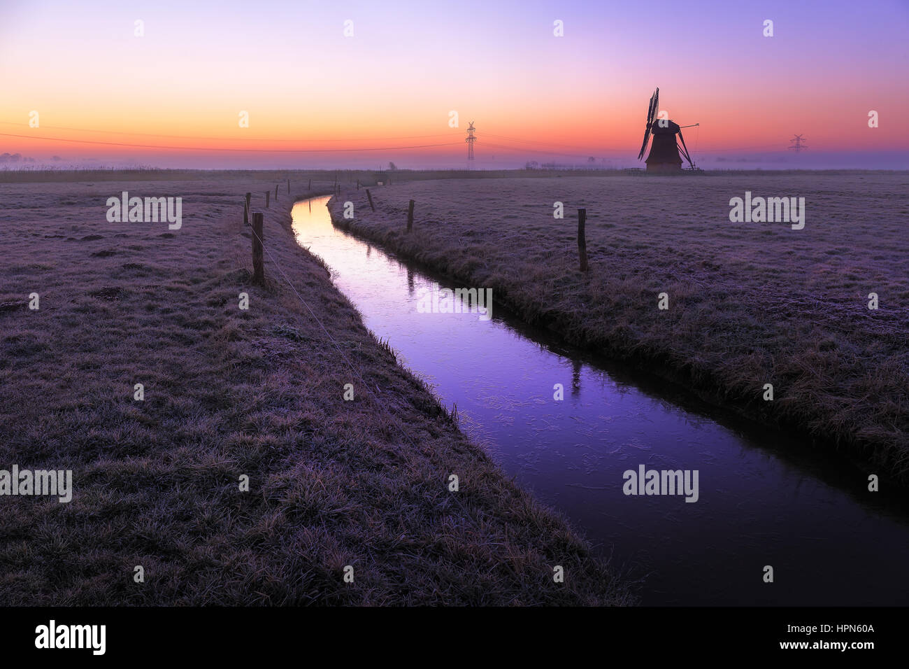 Cerca del amanecer en Eastfrisia Neustadtgoedens Sande - Foto de stock