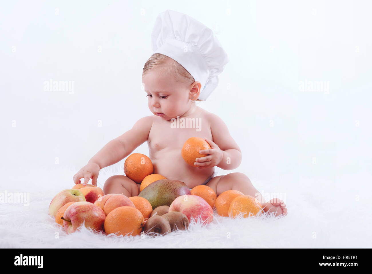 Bebé cocinero fotografías e imágenes de alta resolución - Alamy
