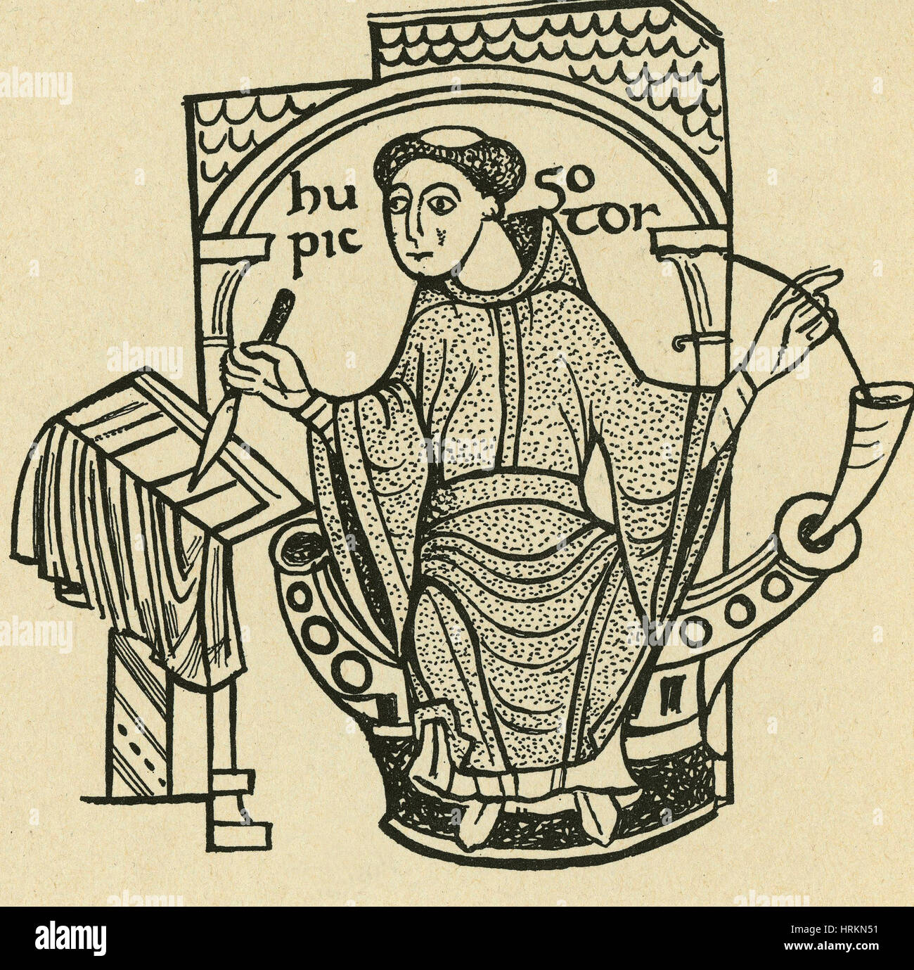 Monje y escribano medieval, del siglo XI. Foto de stock