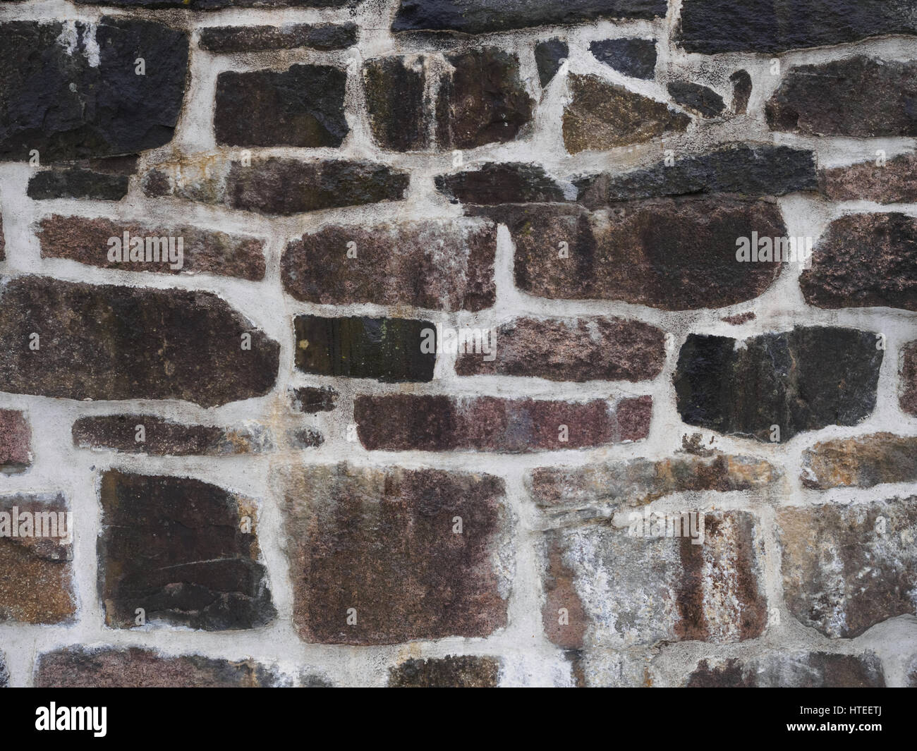 La textura del viejo y wett pared de roca de fondo. Foto de stock