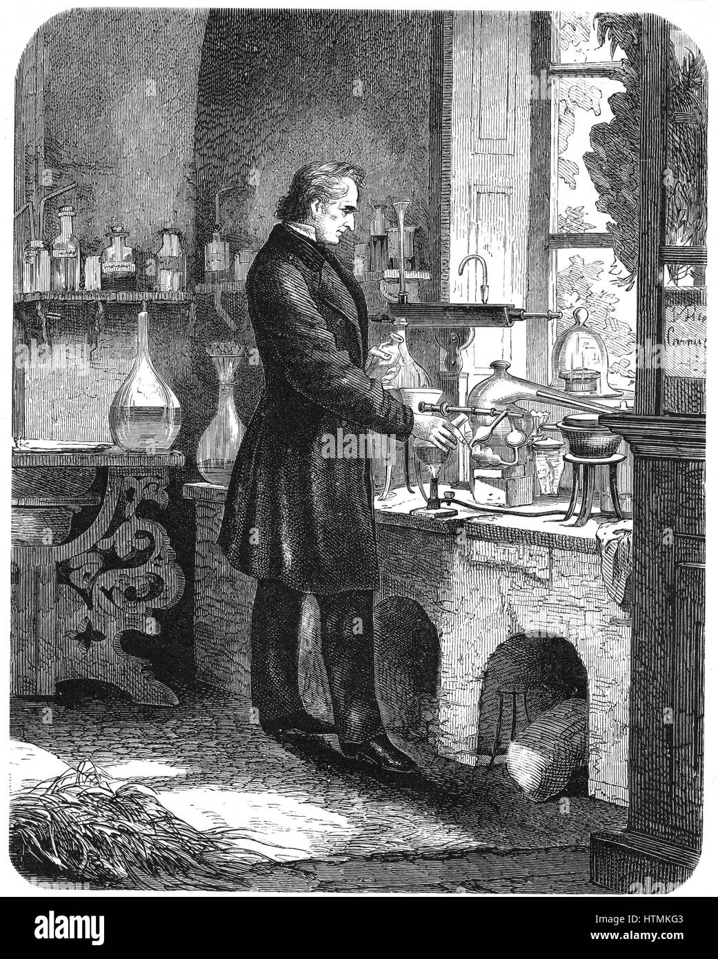 Justus von liebig (1803-1873) químico alemán, trabajando en su laboratorio. Grabado de 'El educador popular", Cassell, Petter y Galpin, Londres (c1885) Foto de stock