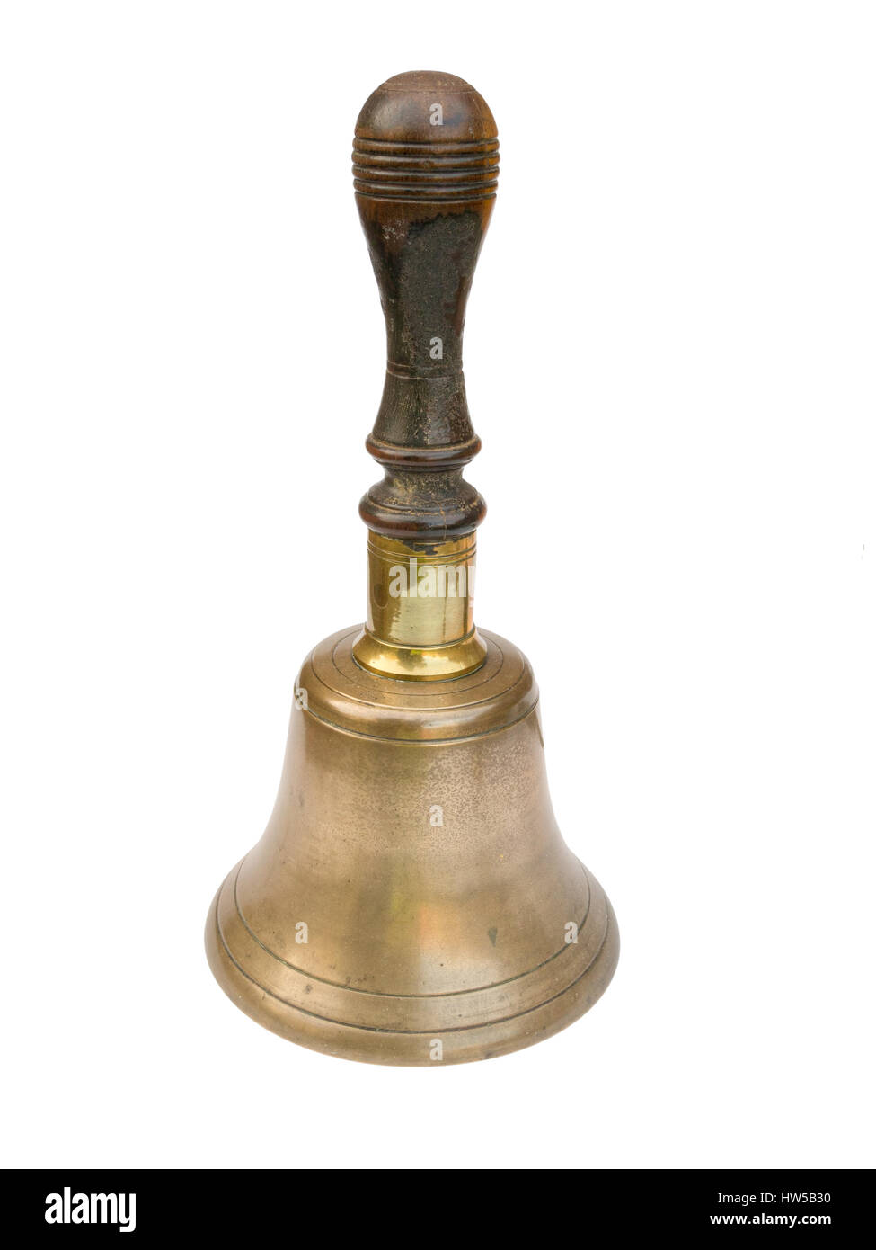 Old school hand Bell. Diseño tradicional, mango de madera. Bien gastado! Foto de stock