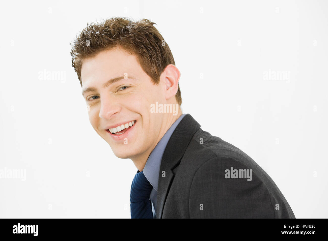Sonriente joven empresario Foto de stock