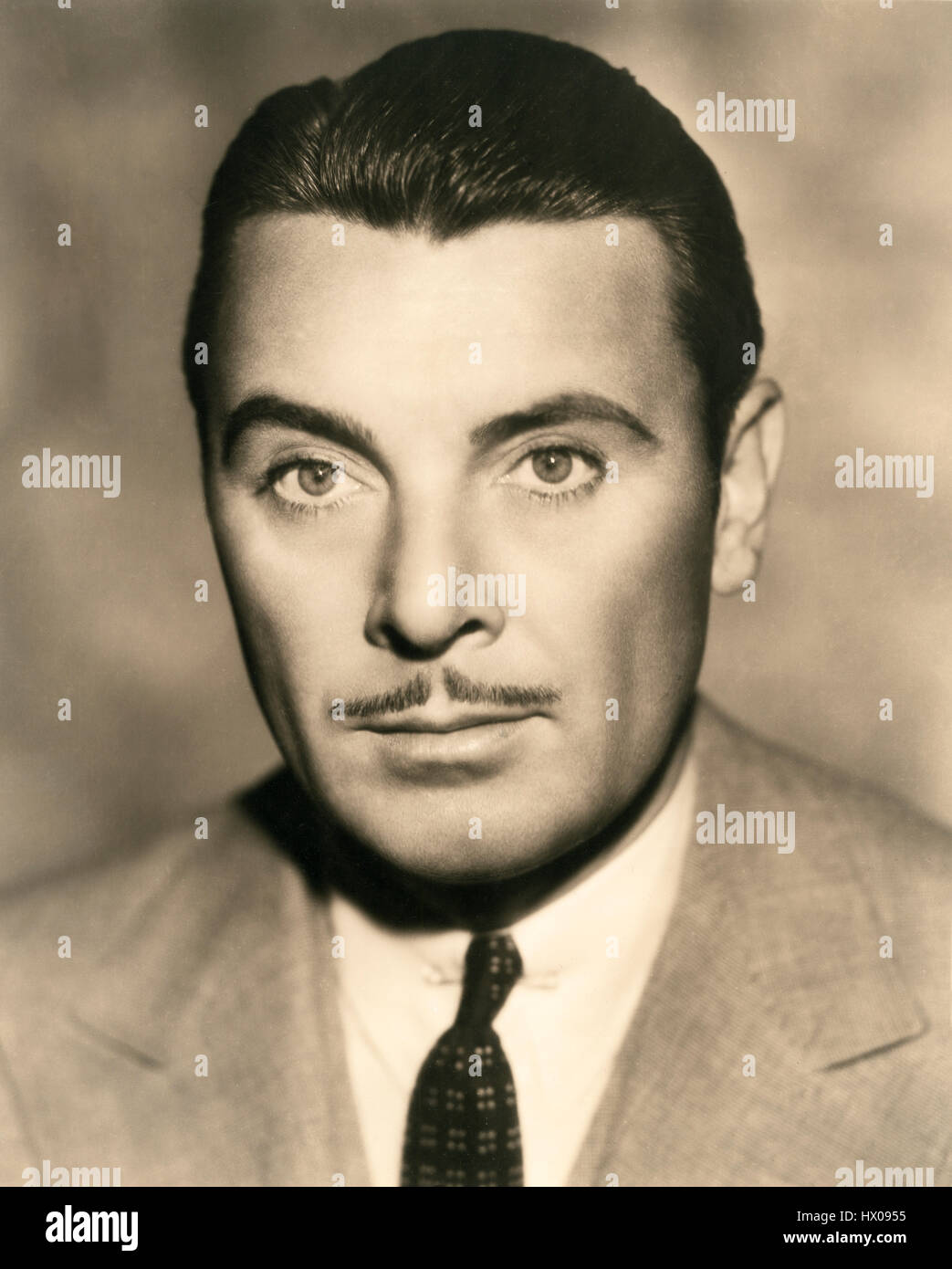 George Brent, cabeza y hombros publicidad retrato, 1940 Foto de stock