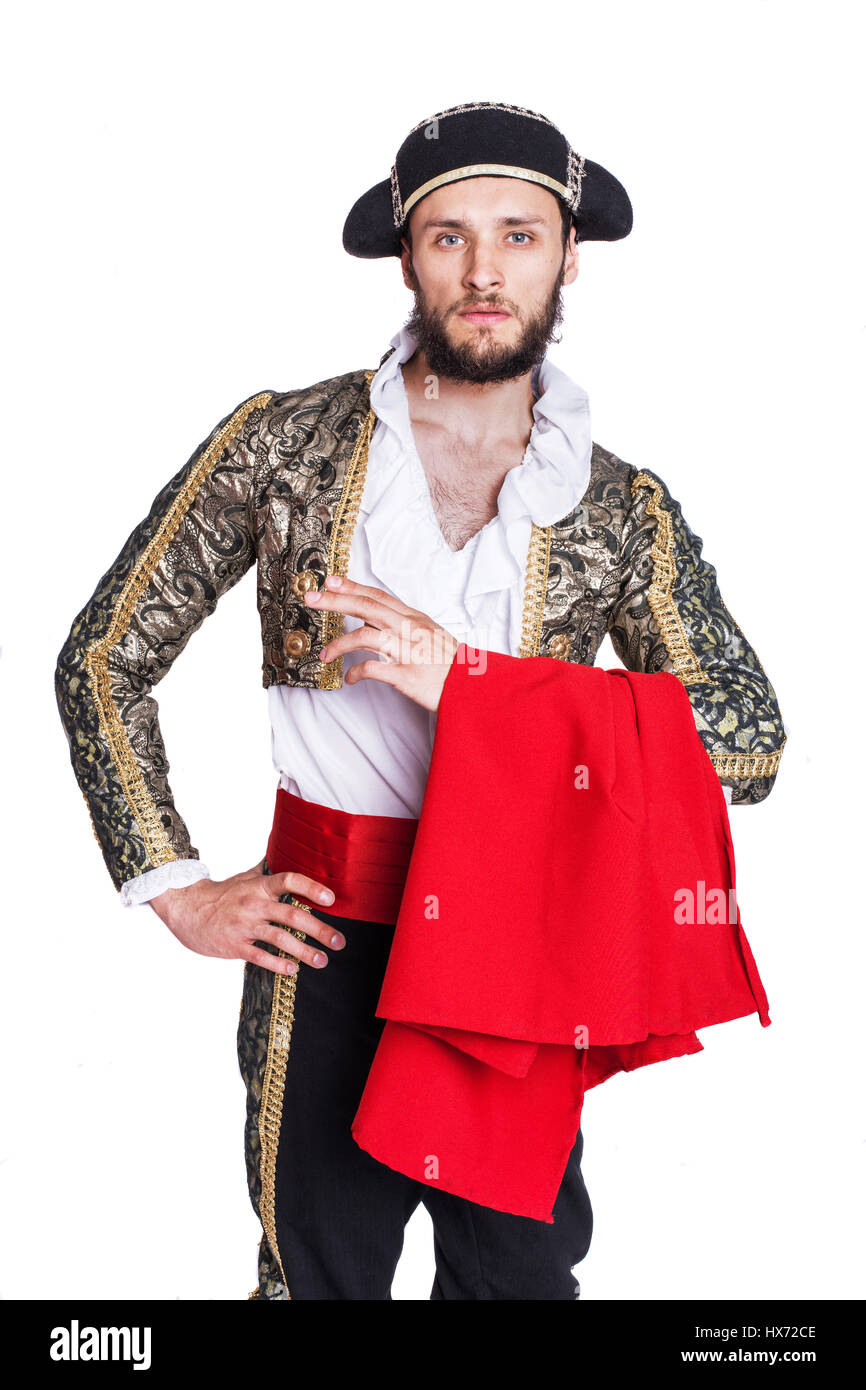 Hombres vestidos como matador sobre un fondo blanco. Retrato de estudio Foto de stock