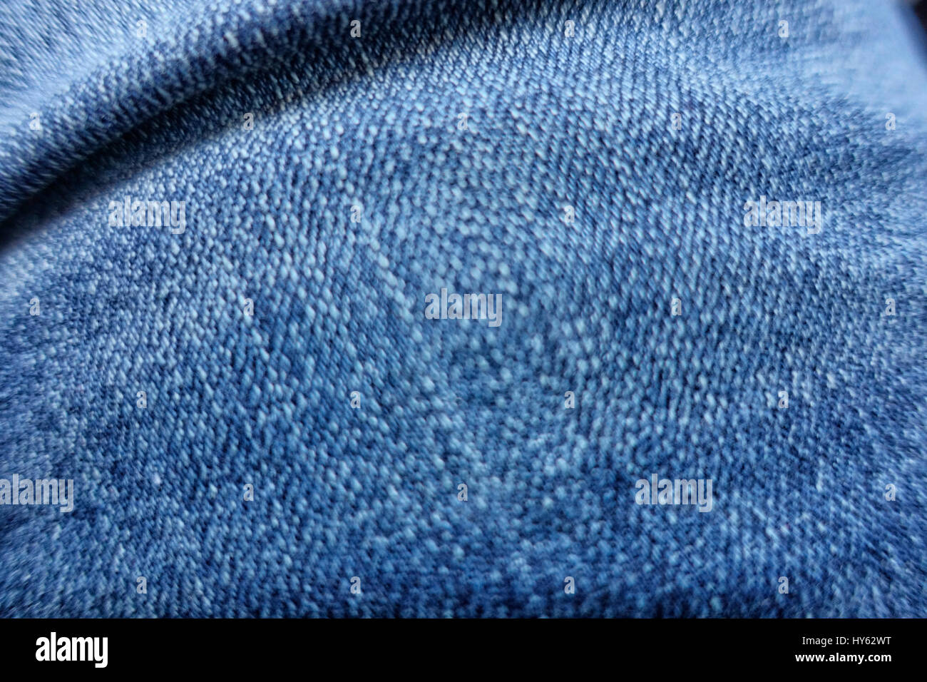 Jeans deshilachados textura de fondo de blue jeans cerrar Foto de stock