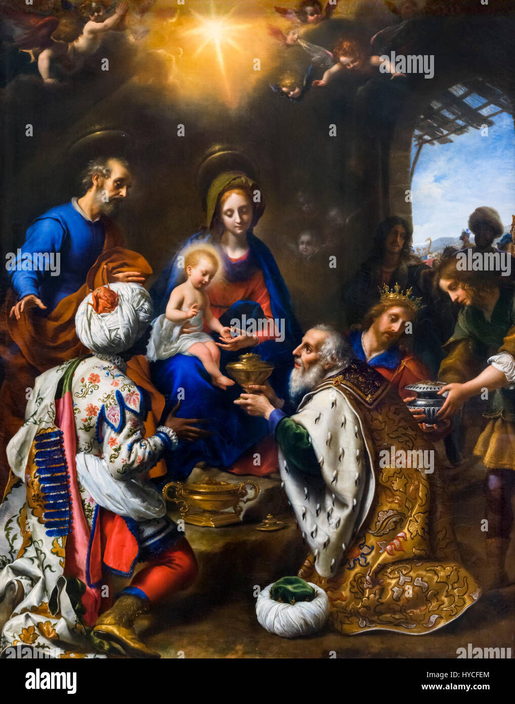 Escena de la natividad. La adoración de los Reyes por Carlo Dolci (1616-1686), óleo sobre lienzo, 1649. El niño Jesús recibiendo regalos de los Reyes Magos. Foto de stock