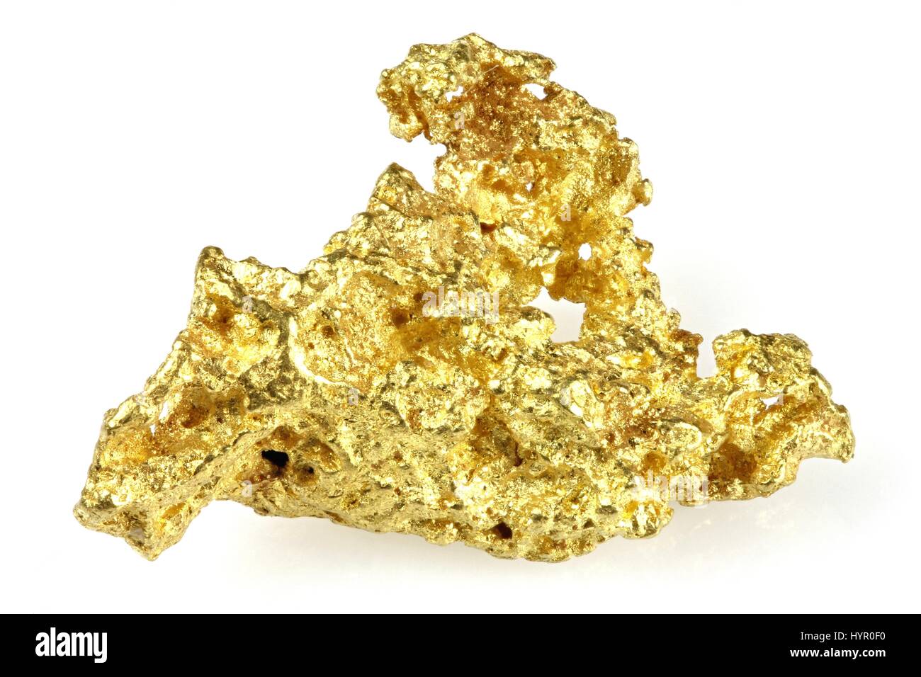 Pepita de oro encontrada en Queensland/ Australia aislado sobre fondo blanco. Foto de stock