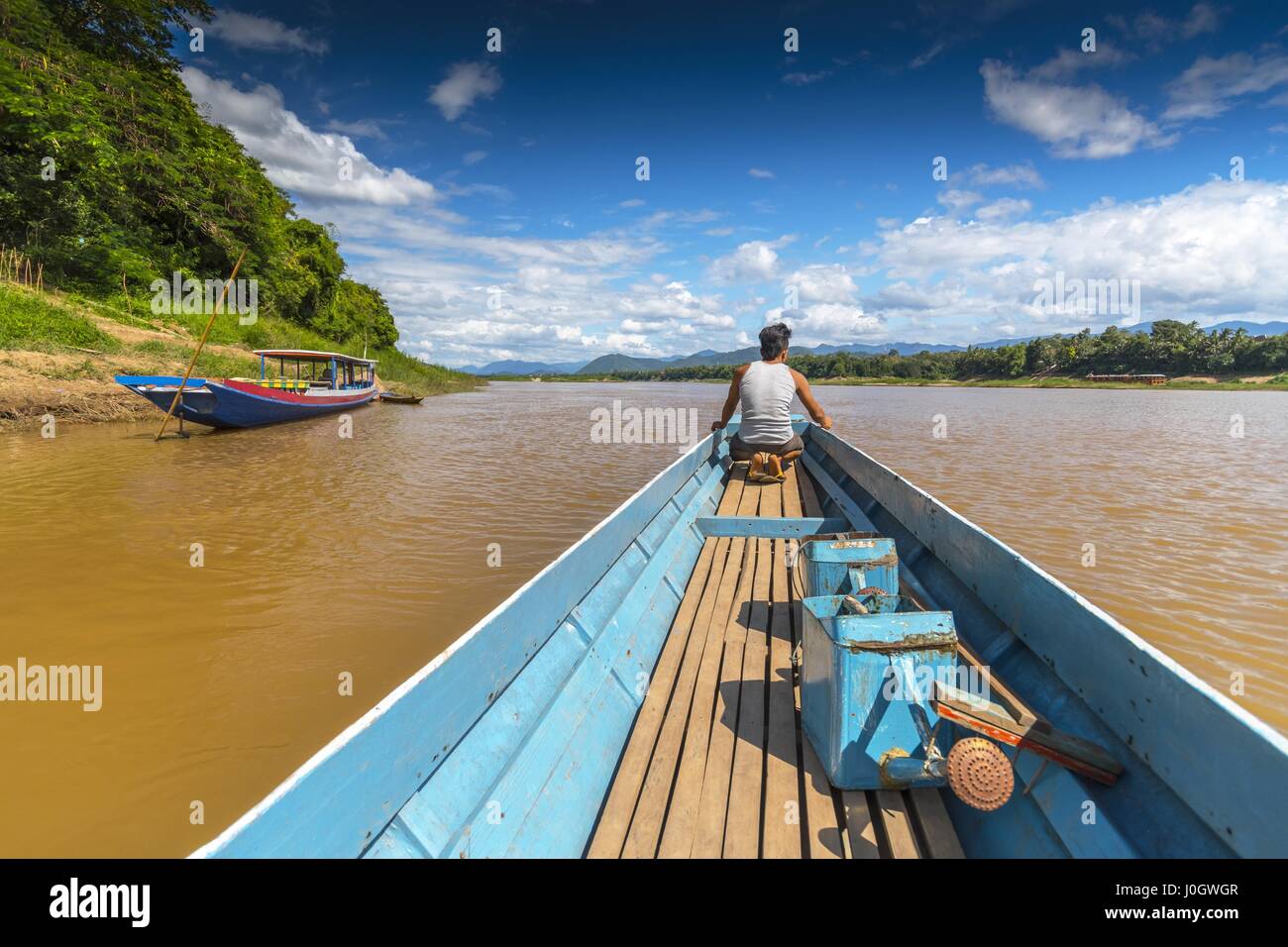 Río turístico en barco por el río Mekong, Luang Prabang, en Laos, en Asia. Foto de stock