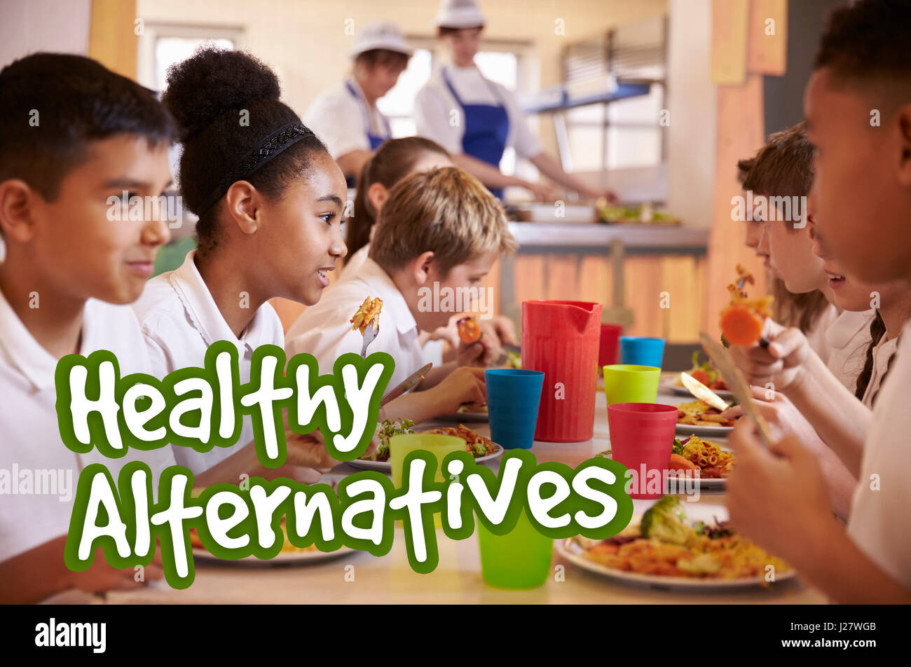 Los niños de la escuela alternativa saludable comer comidas Foto de stock