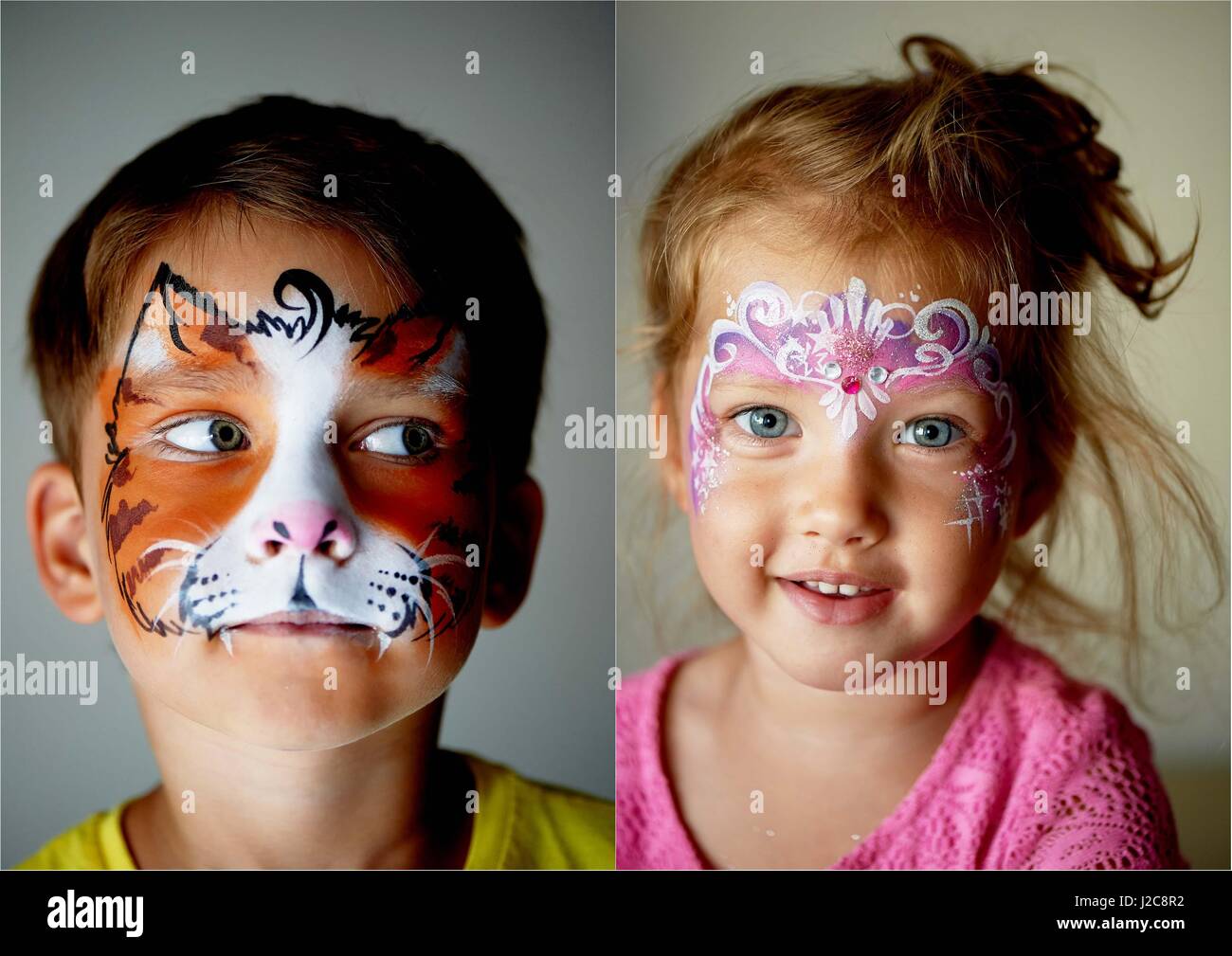 Niño de 6 años con ojos azules pintura de cara de un gato o un tigre.Muy  emocionante blue-eyed girl de 2 años con una pintura de cara Fotografía de  stock - Alamy