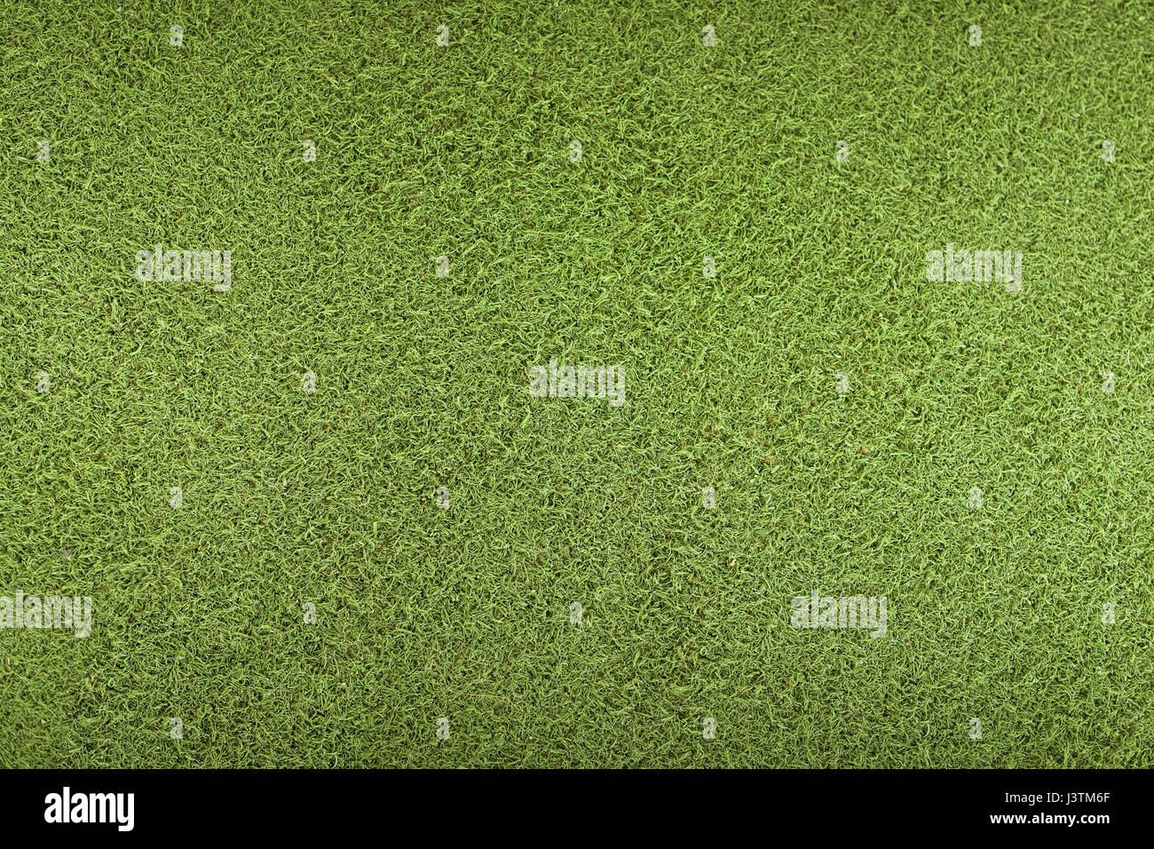 Textura verde césped artificial Foto de stock