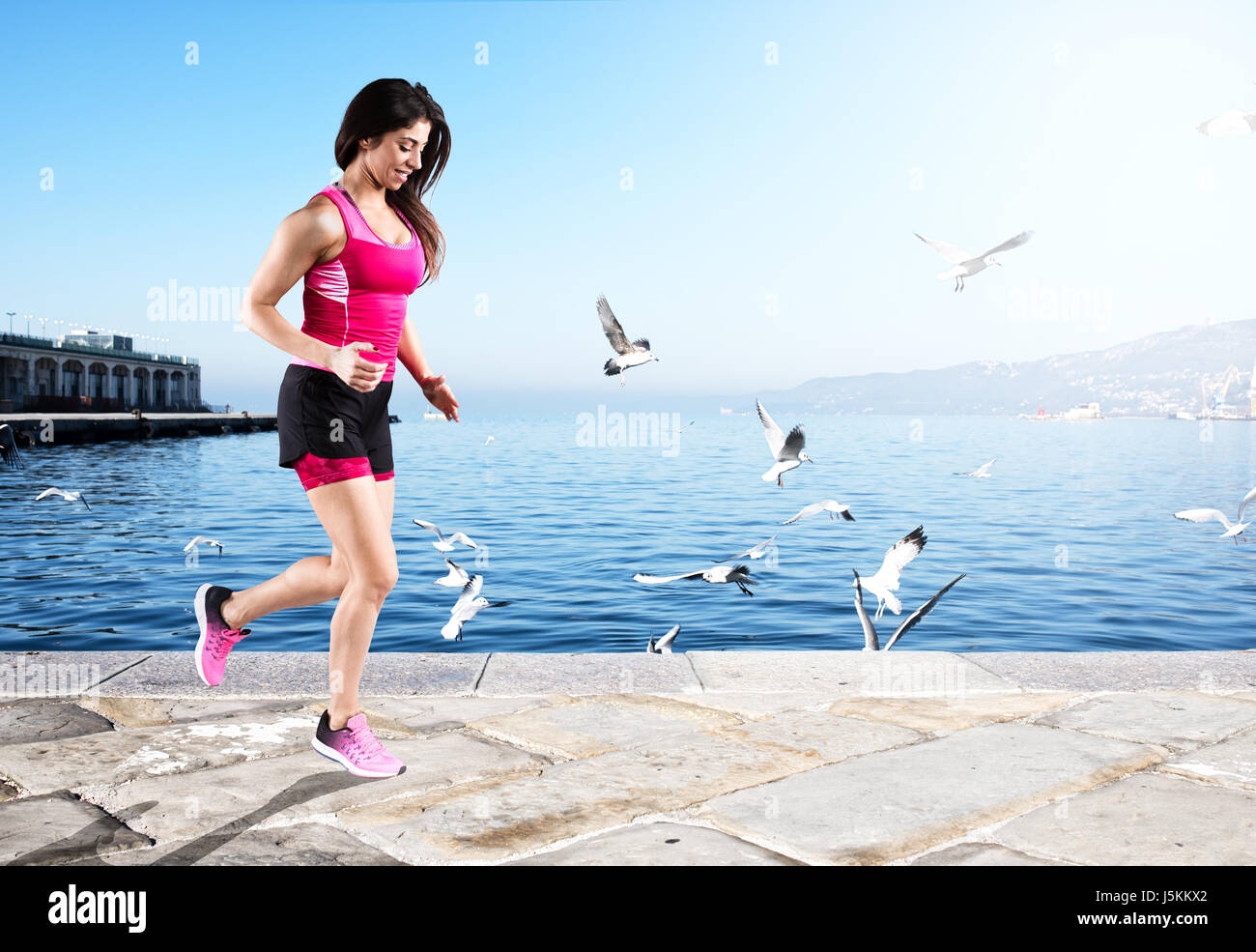 Mujer atlética runner Foto de stock