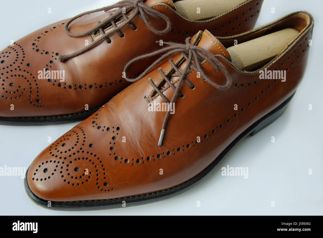Zapatos de cuero Ropa de trabajo ropa shoelace footgear zapata shoetree Foto de stock