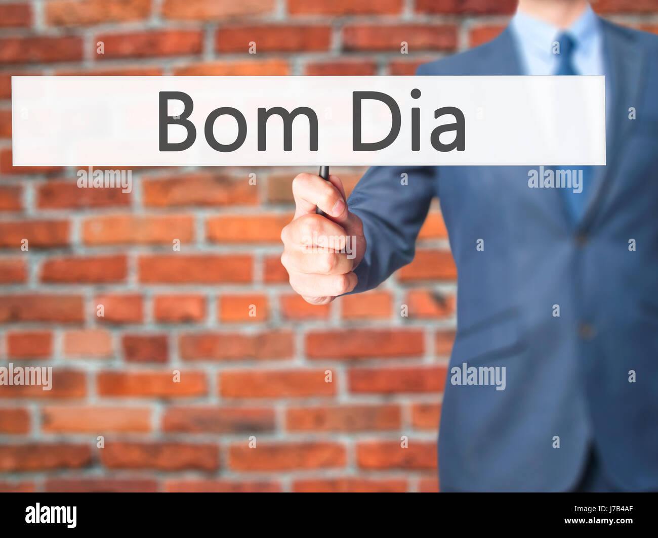 Bom Dia (en portugués: Buenos días) - El empresario mano sujetando firme.  Negocios, tecnología, internet concepto. Stock Photo Fotografía de stock -  Alamy