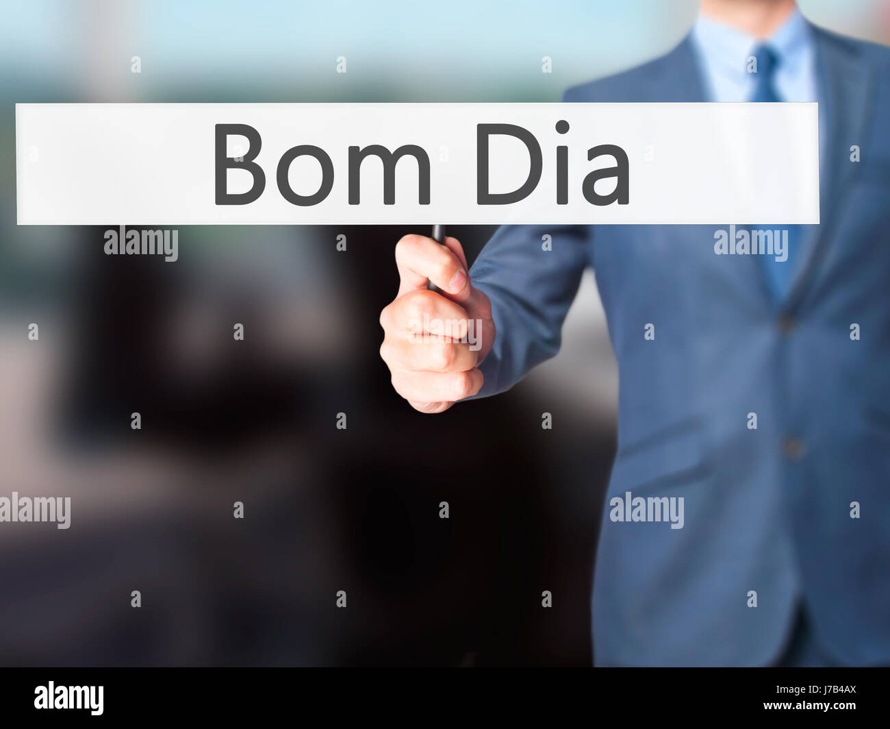 Bom Dia (en portugués: Buenos días) - El empresario mano sujetando firme.  Negocios, tecnología, internet concepto. Stock Photo Fotografía de stock -  Alamy