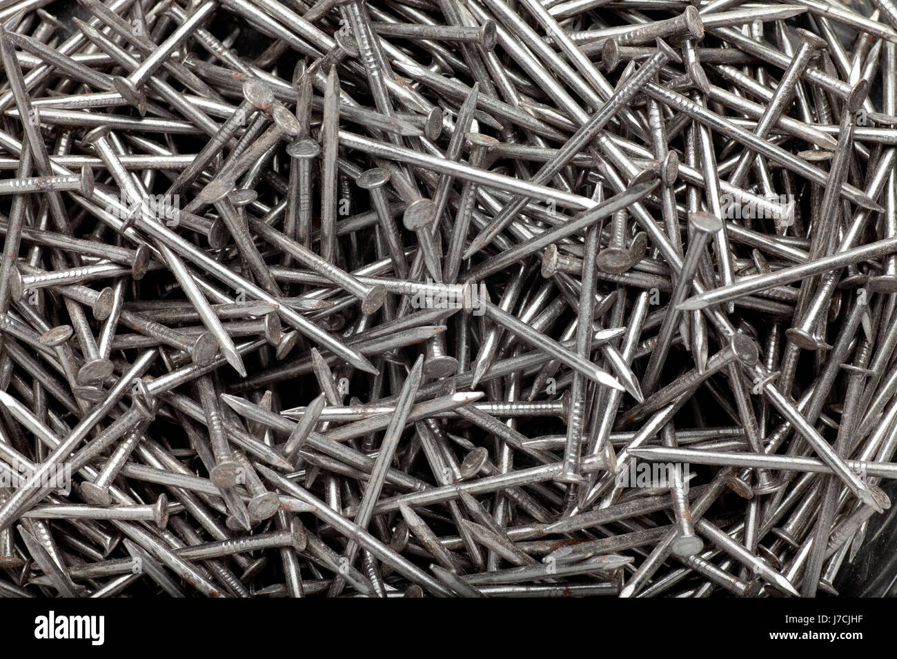 Herramientas patrón de metal de hierro telón de fondo útil construir objetos  de uñas Fotografía de stock - Alamy