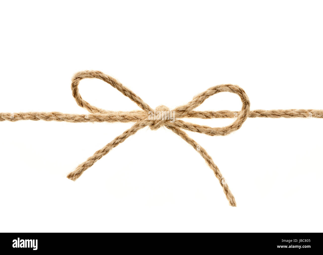 Acercamiento de hilo trenzado atadas en un nudo de lazo aislado sobre fondo  blanco Fotografía de stock - Alamy
