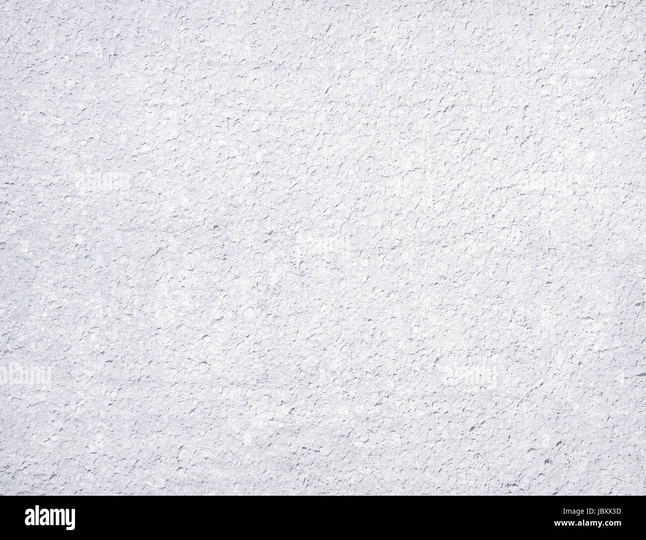 Antecedentes roughcast en blanco - Blanco granular textura de pared Foto de stock