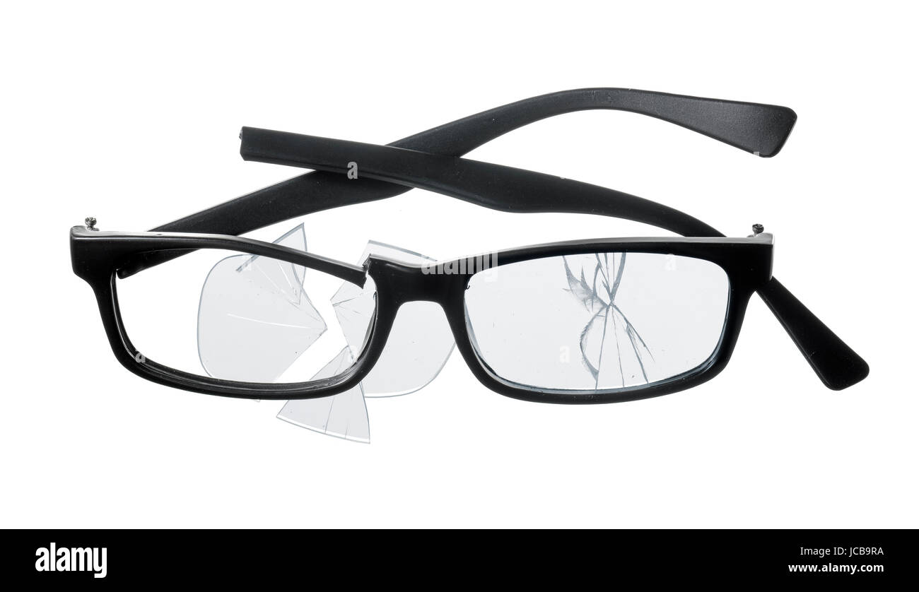Plástico barato gafas de lectura sobre fondo blanco roto. Foto de stock