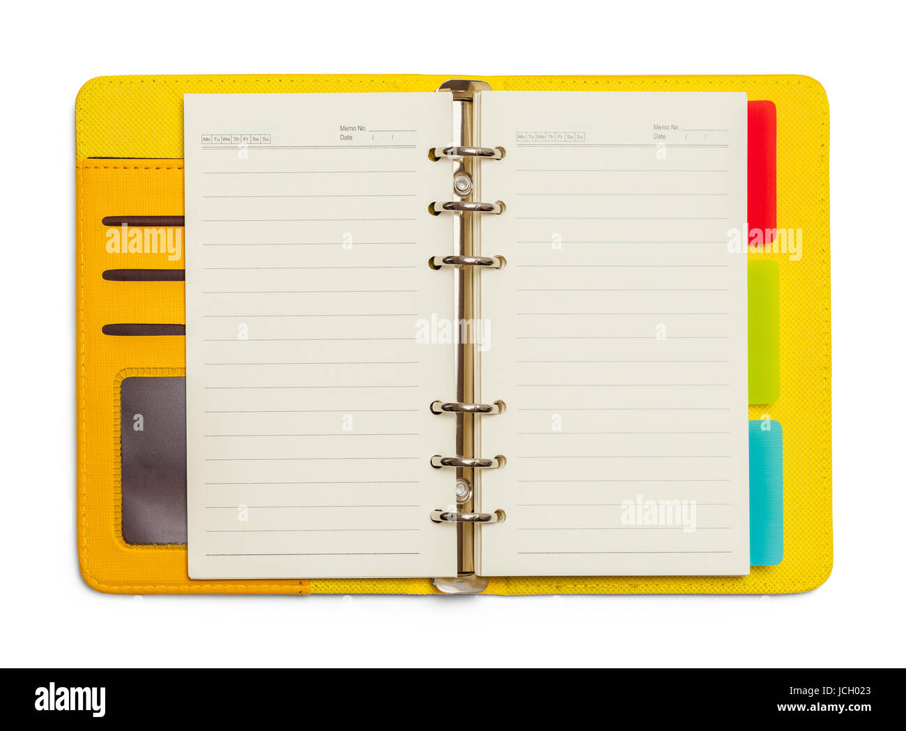 Planner Oragnizer amarillo abierto aislado sobre fondo blanco. Foto de stock