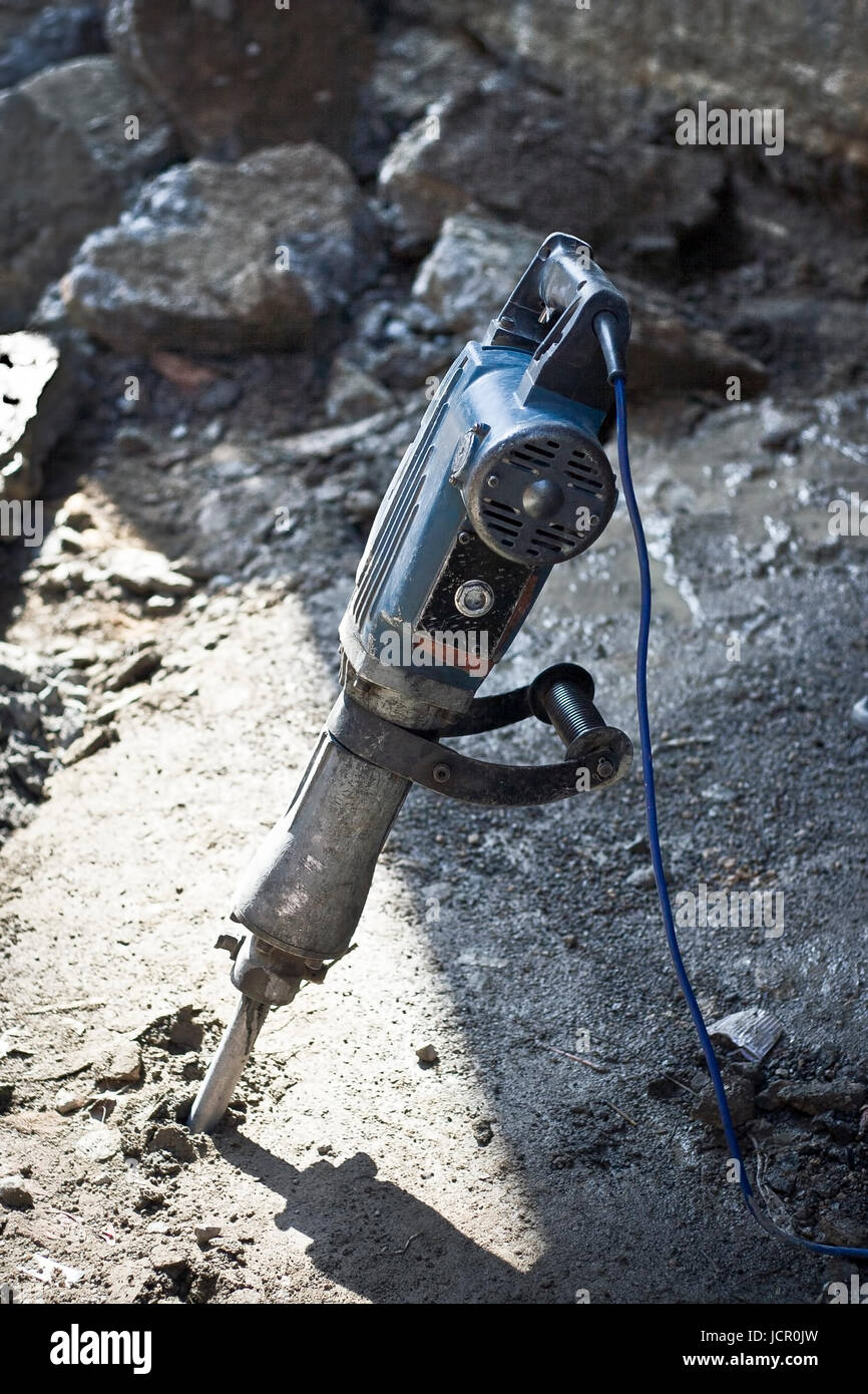 Máquina para perforar o romper el cemento y asfalto Fotografía de stock -  Alamy