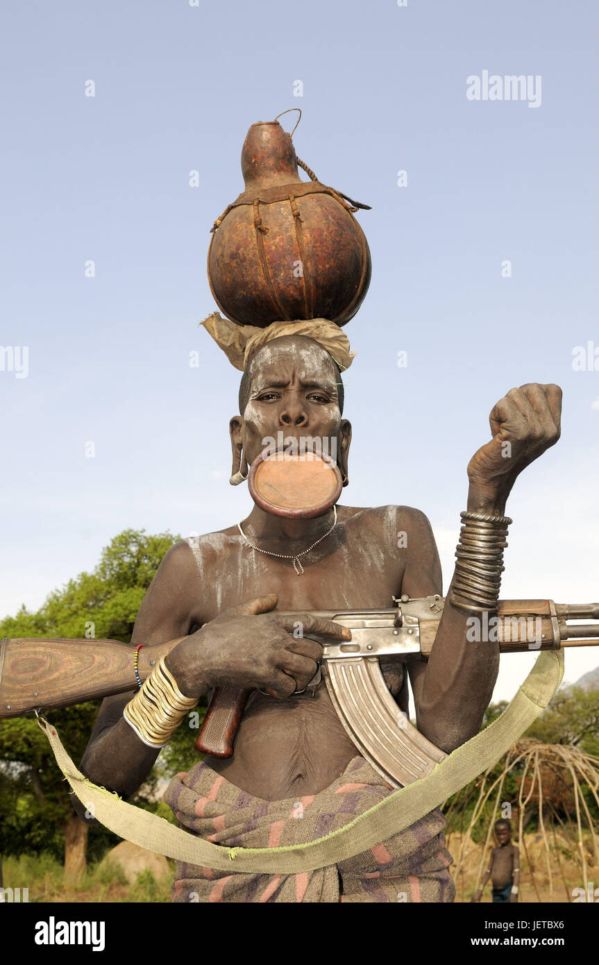 Hombre, la tribu Mursi, el reborde de placa, la calabaza, la cabeza, Gun, Mago national park, el sur, el sur de Etiopía, Omotal Foto de stock