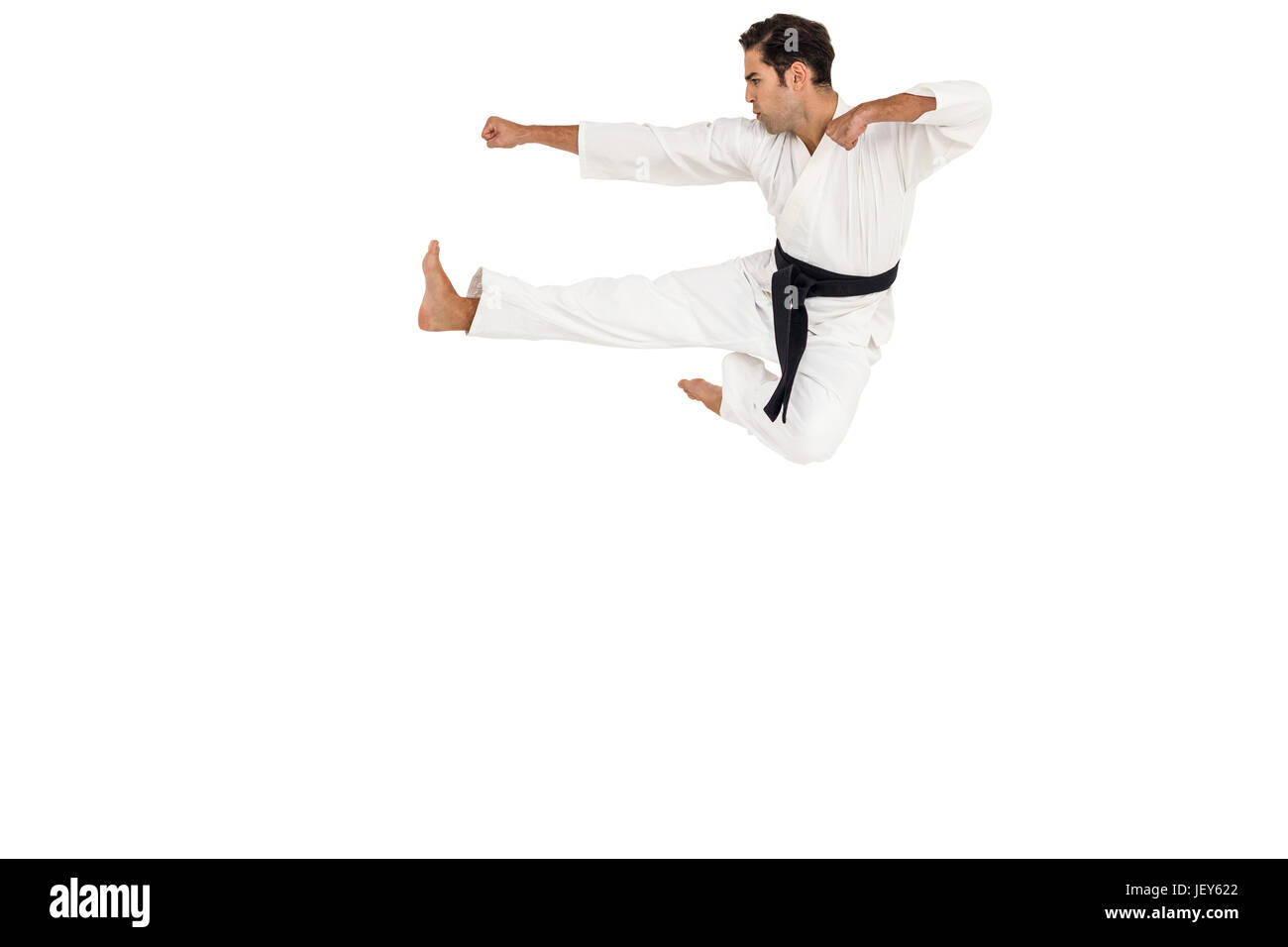 Realizar caza postura karate Foto de stock