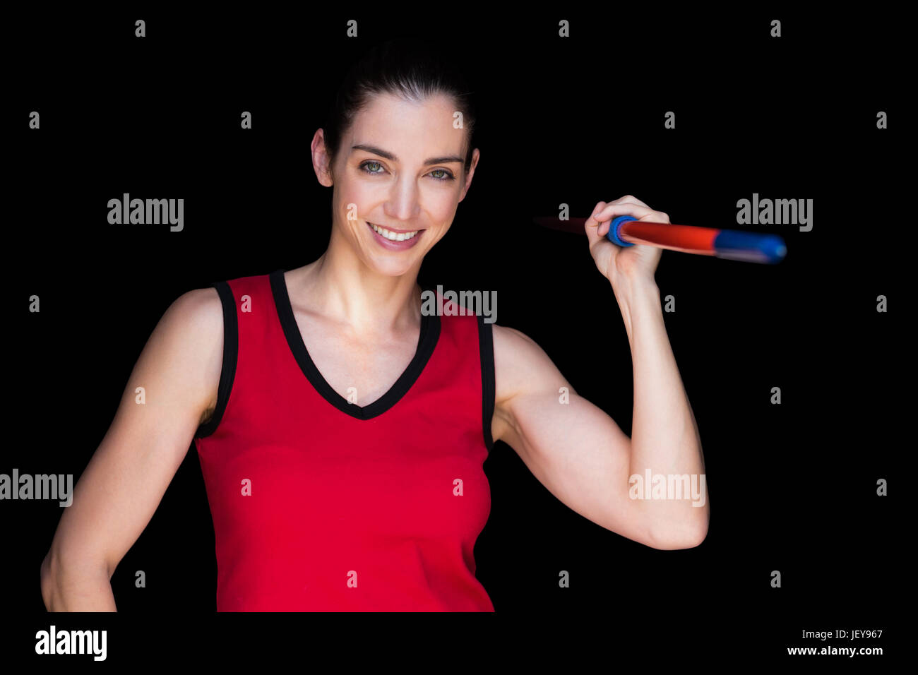 Atleta Femenina lanzando una jabalina Foto de stock