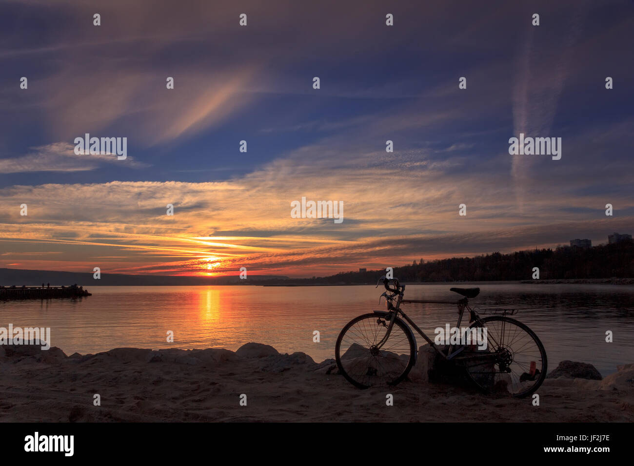 Sunset y bicicleta Foto de stock