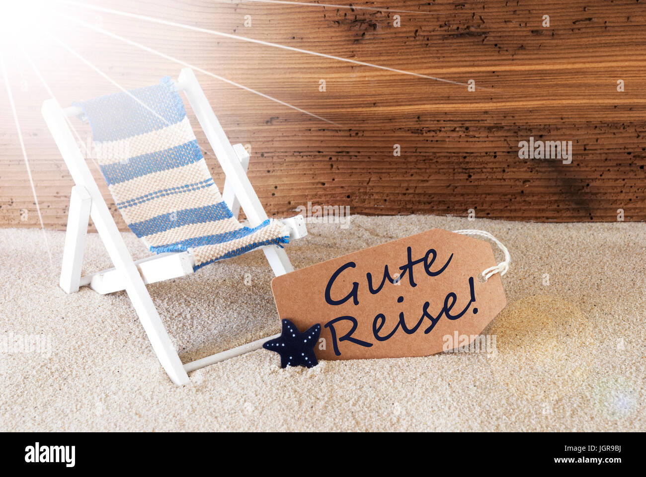 Etiqueta soleado de verano, gute Reise significa Buen viaje Foto de stock