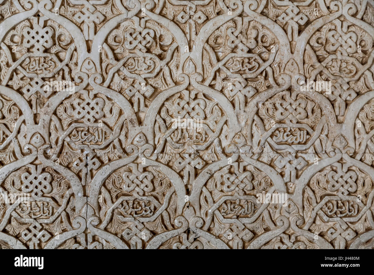 Detalle de la pared, los Palacios Nazaríes, la Alhambra, Granada, España Foto de stock