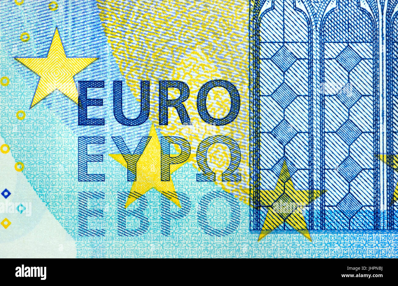 Billete de 20€ detalle mostrando la palabra "euro" en tres alfabetos (latino) - romano, griego y cirílico. Foto de stock