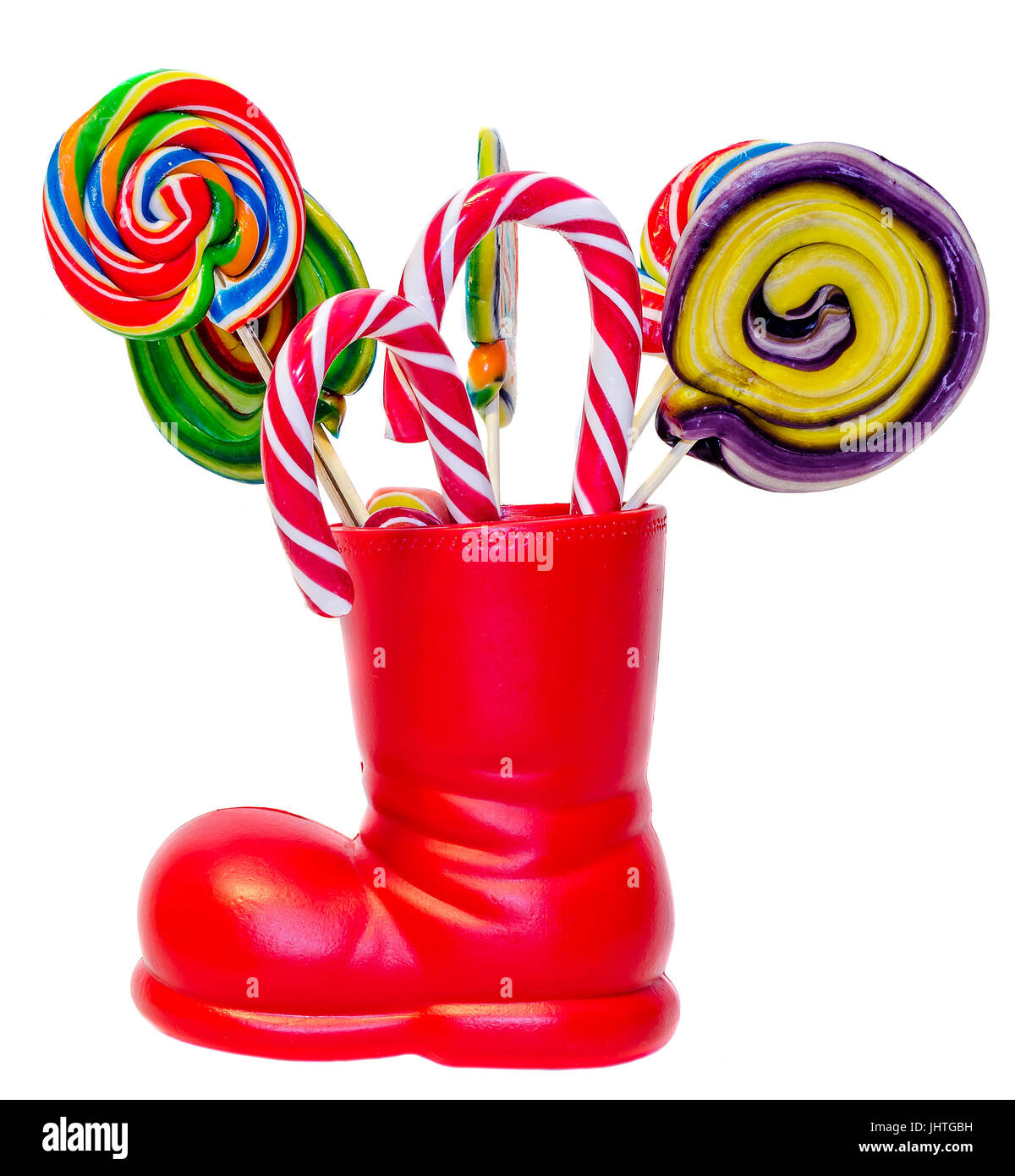 Santa Claus botas rojas, zapatos con dulces colores lollipops, candys. Botas  de San Nicolás, con regalos, regalos Fotografía de stock - Alamy