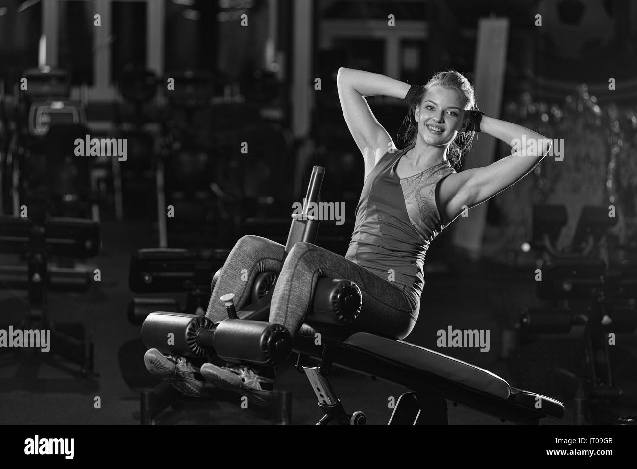 Beautiful woman in gym outfit Imágenes de stock en blanco y negro - Alamy