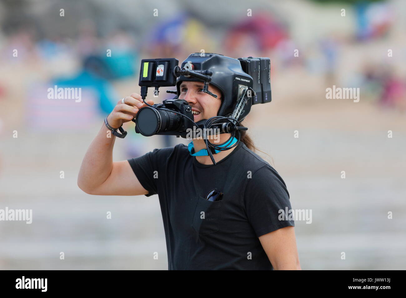 Fistral Beach, Newquay, Cornwall, Reino Unido. 13 Aug, 2017. Los surfistas tomar parte en el día 5 del Campeonato Boardmasters. Este longboard destacados surfistas de todo el mundo. Crédito: Nicholas Burningham/Alamy Live News Foto de stock