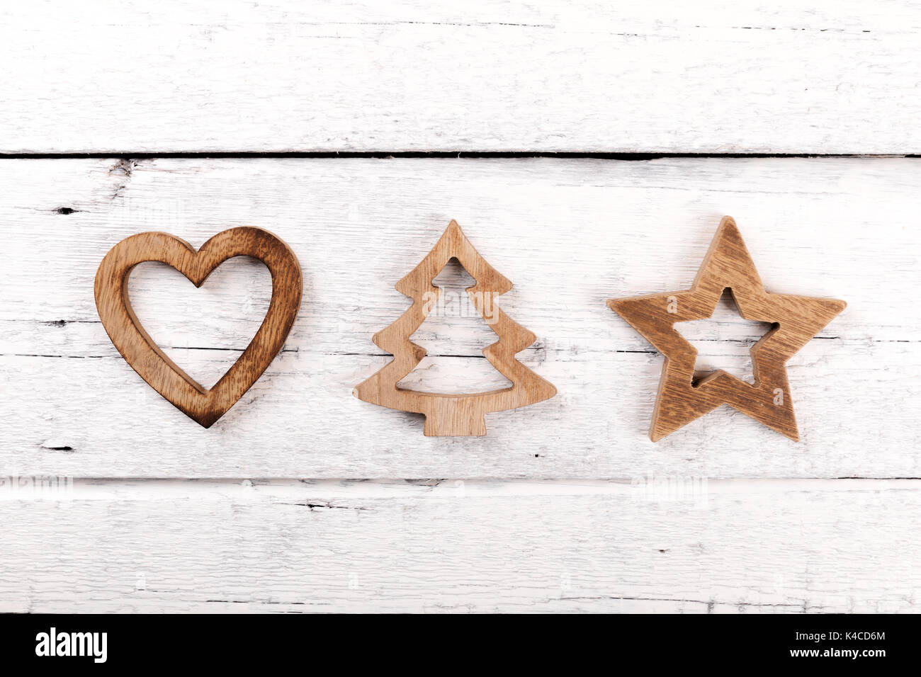 Tarjeta de felicitación de navidad - decoraciones en madera madera blanca antecedentes Foto de stock