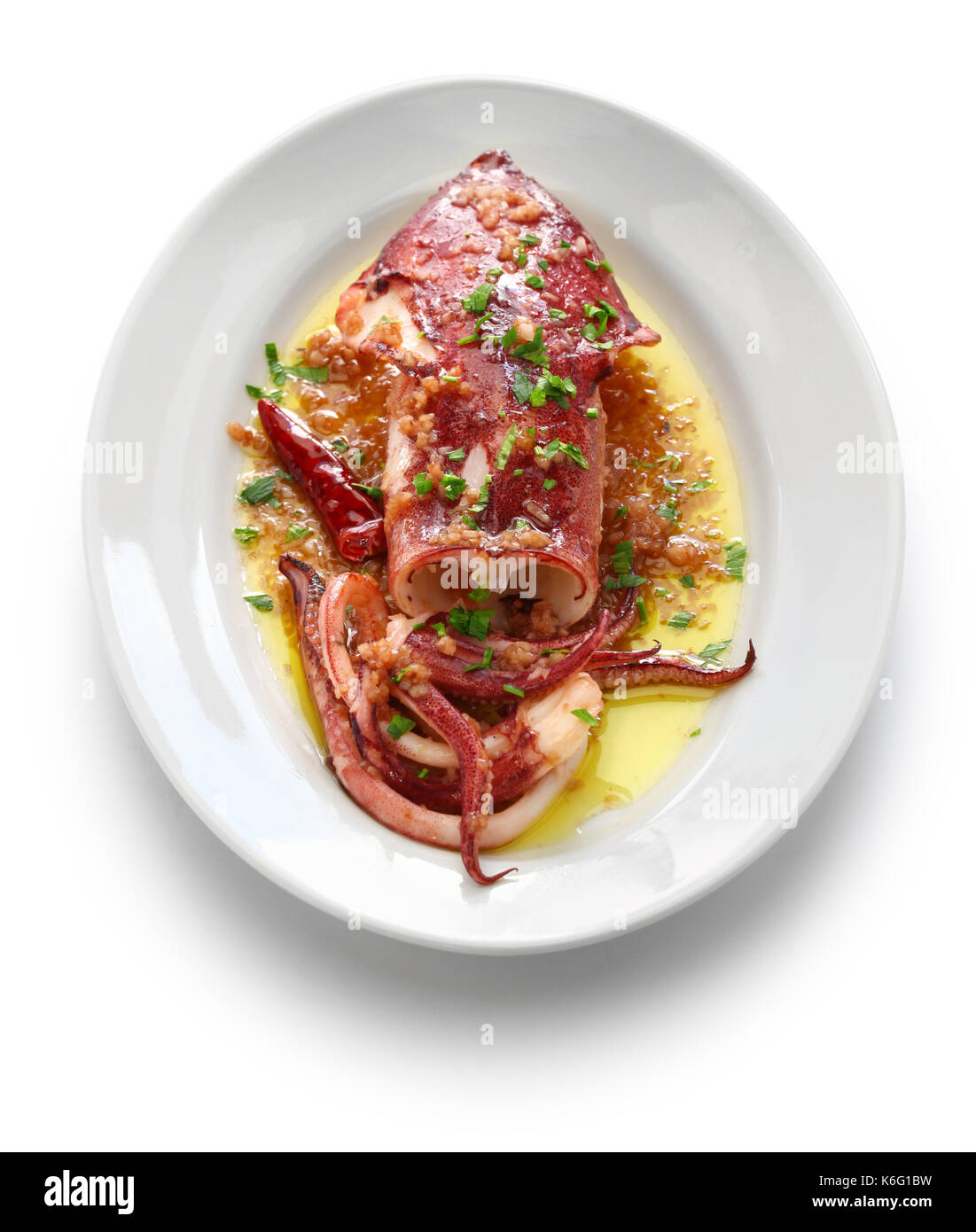 Calamari salteado con perejil y ajo, tapas españolas comida,calamar a la  plancha Fotografía de stock - Alamy