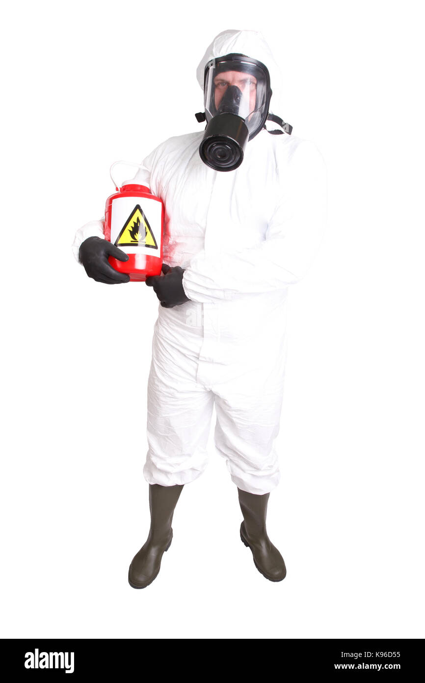 El hombre en traje de materiales peligrosos aislado en blanco Foto de stock