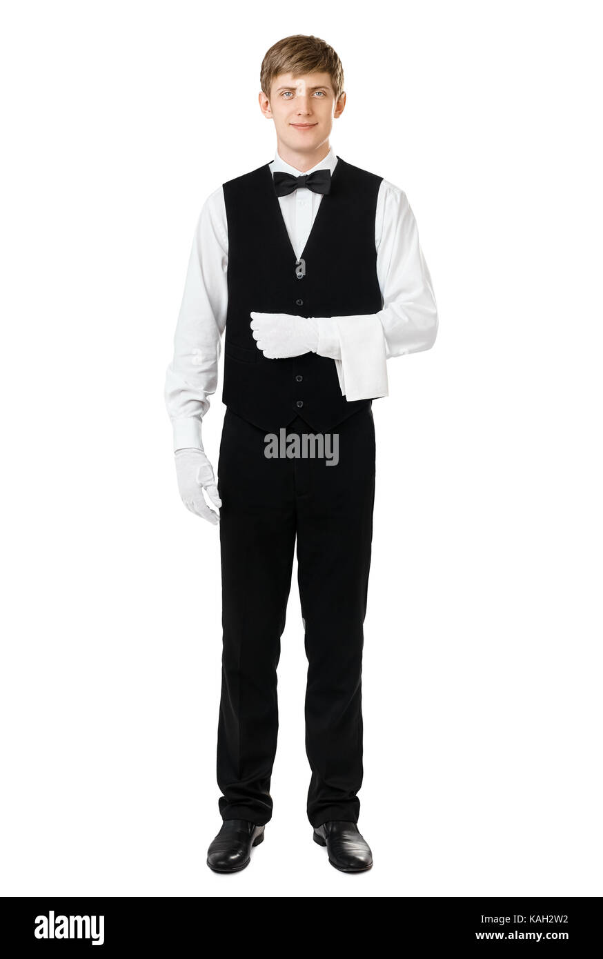 Retrato de longitud completa guapo mozo elegante de pie con toalla brazo  aislado sobre fondo blanco Fotografía de stock - Alamy