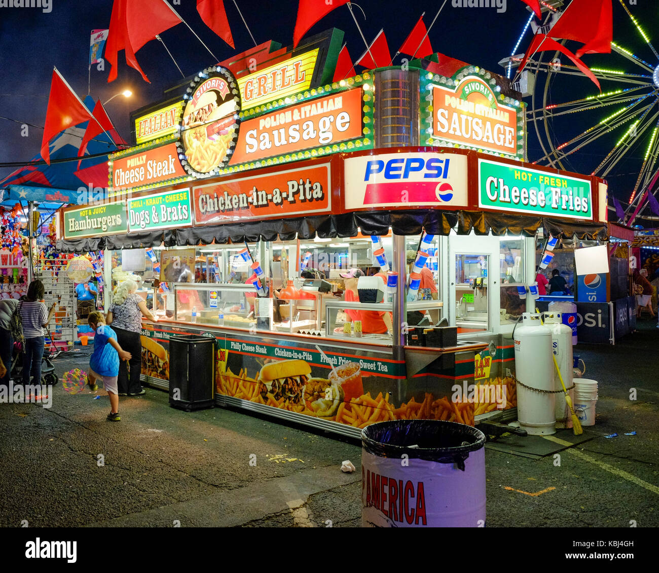 Vendedor de comida de carnaval Midway en el stand en la feria nacional de Alabama que es similar a un Estado justo, en Montgomery, Alabama, Estados Unidos. Foto de stock