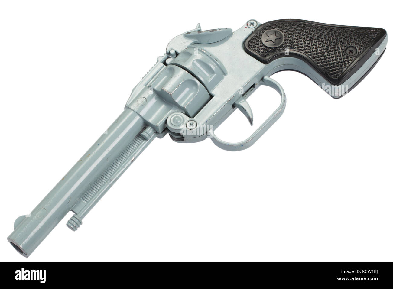 Pistola de juguete retro antiguo aislado sobre un fondo blanco Fotografía  de stock - Alamy