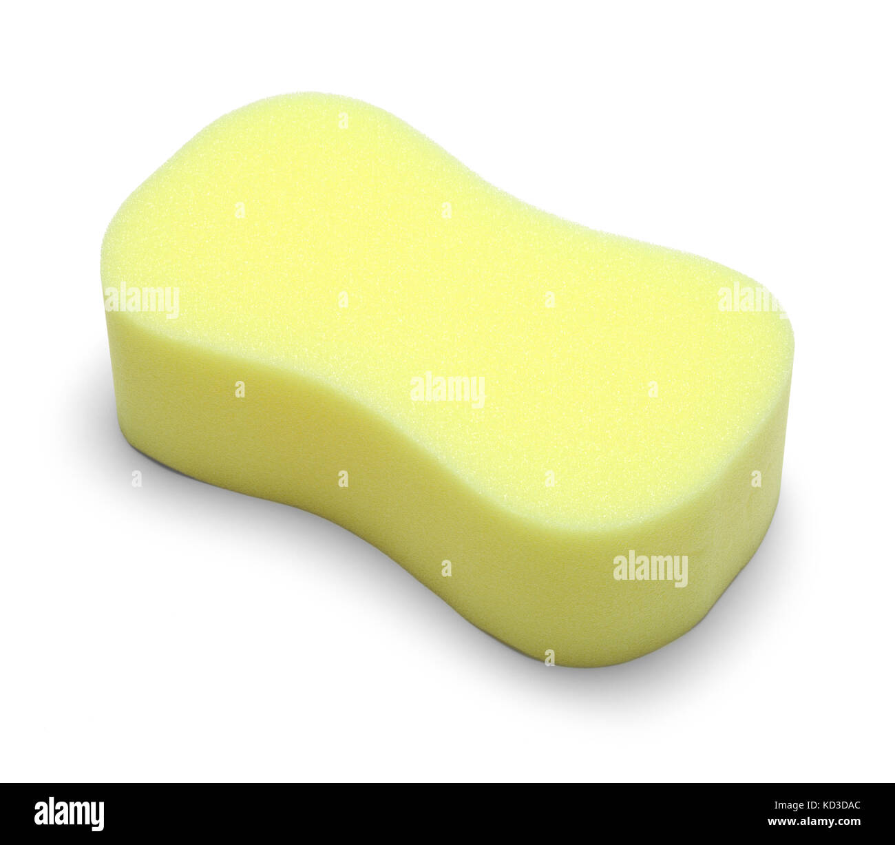 Alquiler de esponja de espuma amarilla aislado sobre un fondo blanco. Foto de stock